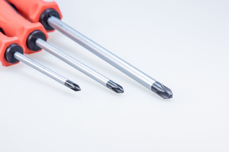 red, close-up, cut out, faceplate, detail, screw, white background, repairing, equipment, man made, screwdrivers, tool kit, single object, phillips, high angle view