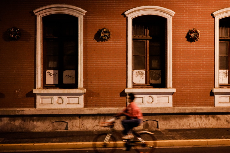 building exterior, home decor, on the move, teen, city, motion, banister, transportation, sports, men, mode of transportation, riding, couch, street, wheel