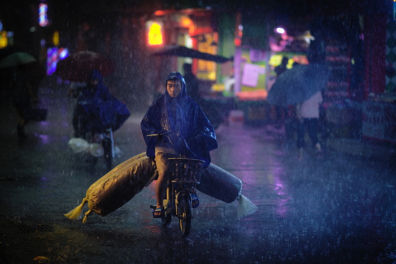 bike, flare, fish, street, human, night, building exterior, animal, machine, coat, one person, vehicle, wheel, 5K, motion, transportation, adult, illuminated