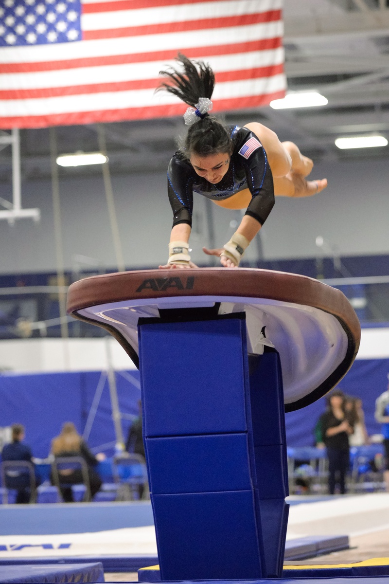 female, vault, sport, somersault, full length, strength, skill, competition, poise, gymnast, women, fitness, college, leisure activity, standing, effort