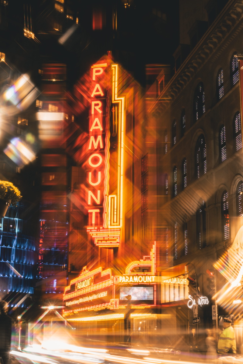 human representation, light trail, night, arts culture and entertainment, male likeness, statue, representation, building, built structure, road, blurred motion