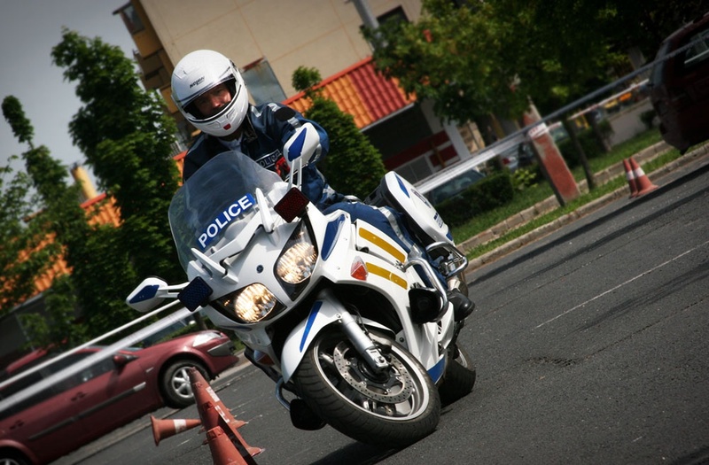 security, outdoors, headwear, riding, ride, crash helmet, men, protection, day, road, real people, helmet, police officer, transportation, sports helmet