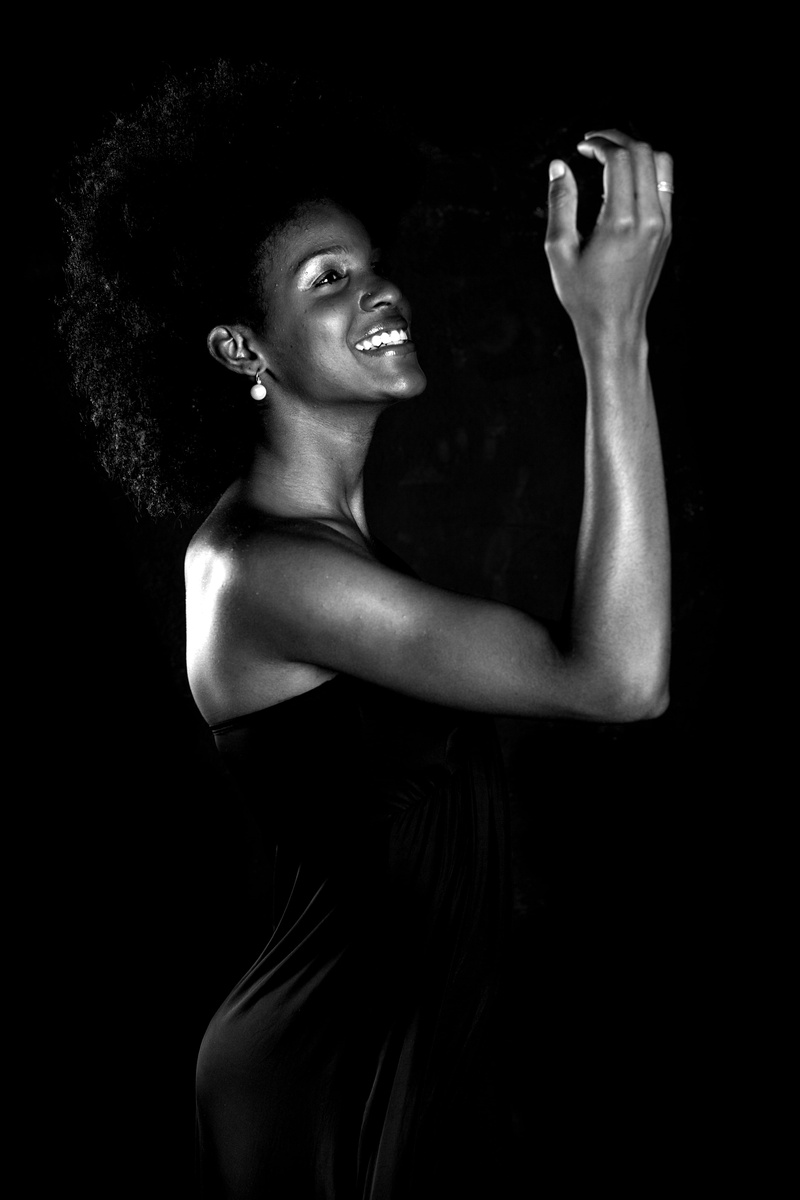 standing, portrait, nose, dress, style, teeth, beautiful woman, 5K, one person, human, dark, young adult, smiling, grayscale, studio, young, wearing, happy