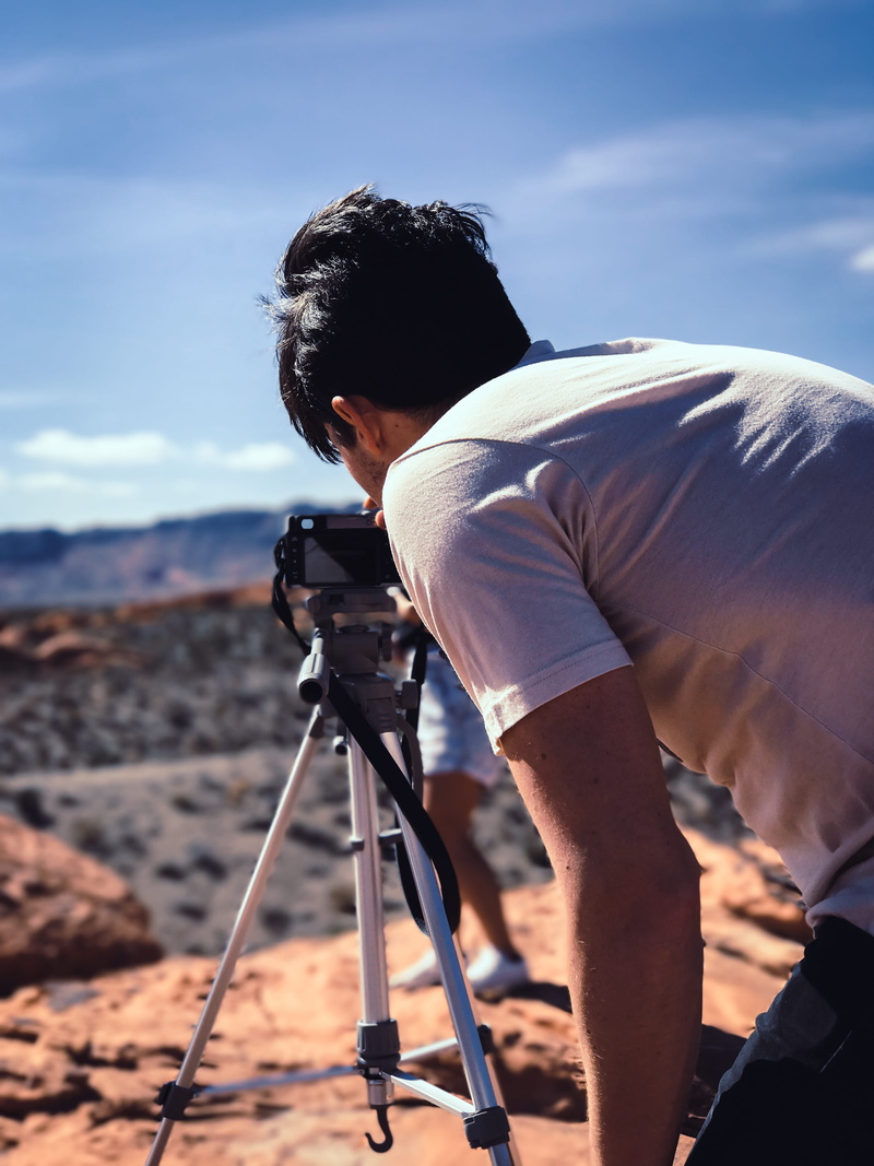 company, cloud - sky, casual clothing, leisure activity, bushes, vintage camera, photographer, activity, photographic equipment, photography themes, band t