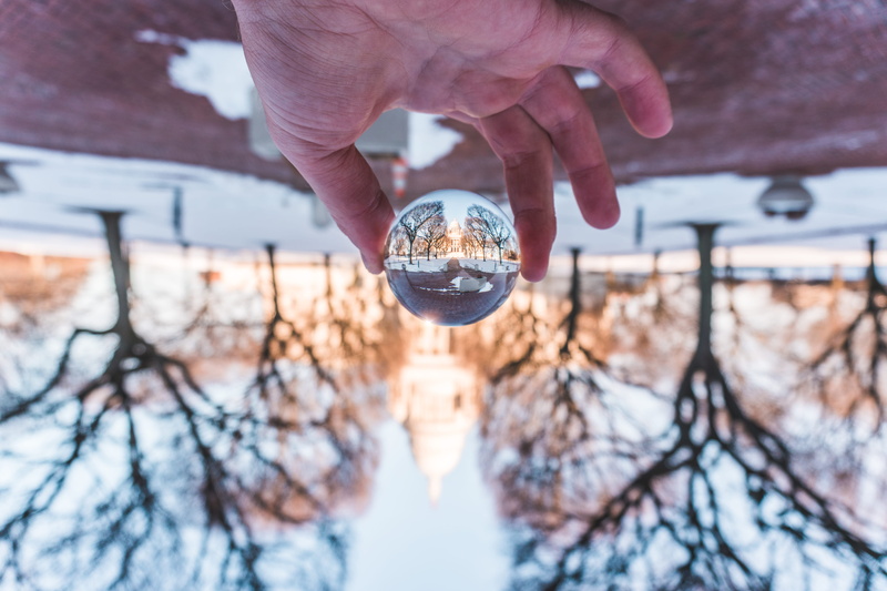 capital, trees, orb, tree, glass, reflection, finger, united states, human finger, body part, building, providence, snow, transparent, outdoors, focus on foreground