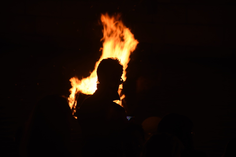 standing, risk, fire - natural phenomenon, burning, outdoors, orange color, nature, fire, providence, heat - temperature, silhouette, bonfire, sign, night