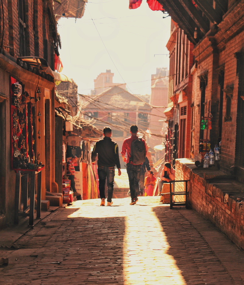 town, alley, day, shops, daytime, urban, built structure, architecture, the way forward, two people, city, building exterior, street, tourism, tourists