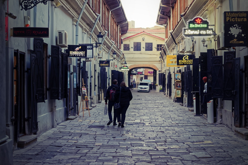 direction, two, built structure, town, adult, group, 5K, daylight, day, building exterior, narrow, stores, walking, person, buildings, building, one person