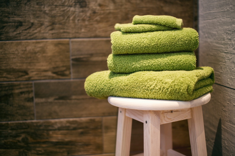 seat, stool, wood, interior, dry towel, indoors, linen, bathroom, textile, relaxation, focus on foreground, dry, pattern, chair, close-up, material, absence