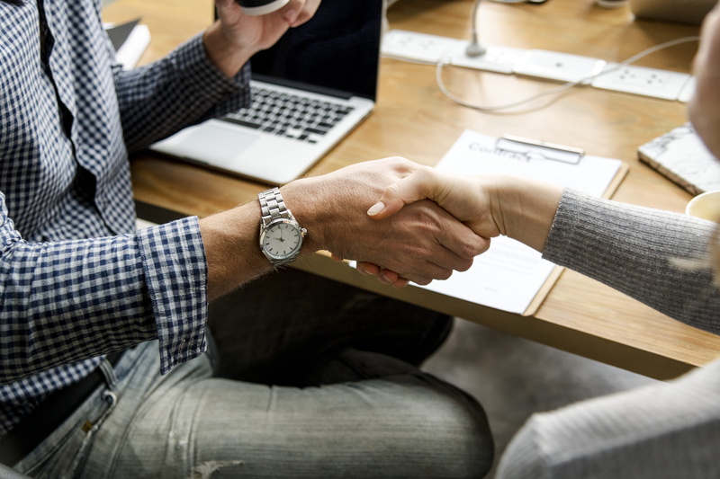 business agreement, using laptop, colleague, mature adult, handshake, indoors, gesture, closeup, connection, 4K, technology, hands, investment, cooperation