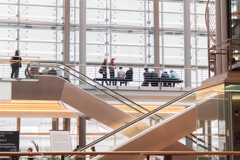women, community, indoors, day, travel, group of people, real people, railing, work, men, office, people, window, cooperate, beside, adult, meeting, standin