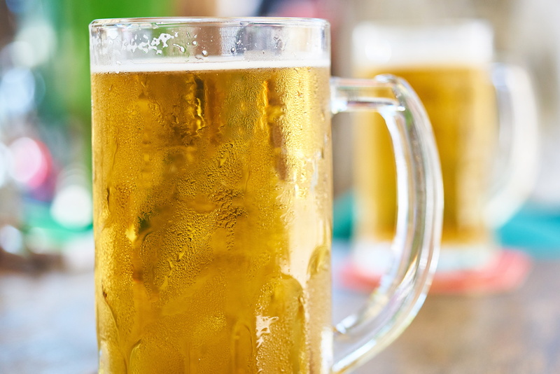 clear, alcohol, sociability, glass - material, cold, indoors, lager, drinking glass, night life, food and drink, frothy drink, bar, pint glass, beer, household equipment