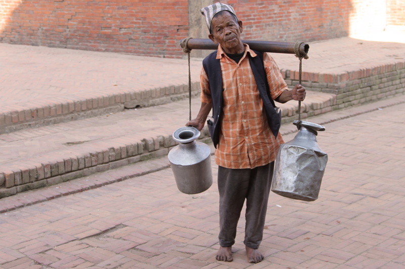 holding, architecture, mature adult, men, one person, brick, mature men, sidewalk, sociable, 4K, footpath, bhutan, males, casual clothing, city, hard