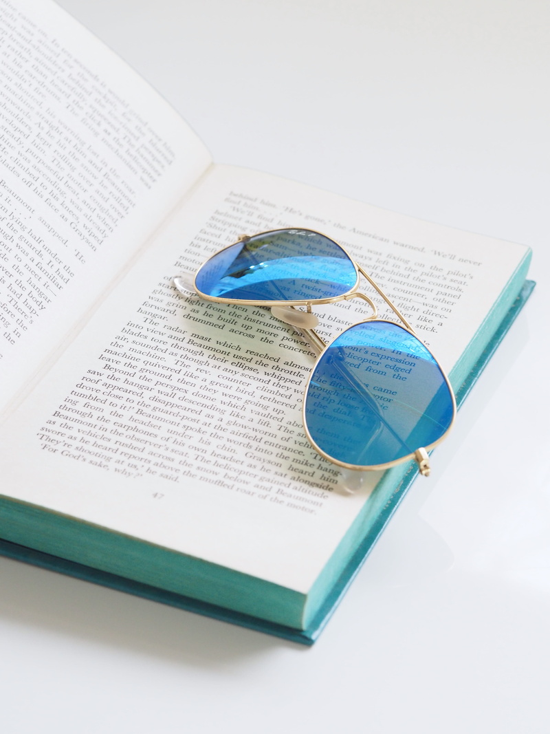 close, study, western script, focus, facts, education, photography, page, blur, research, text, open, sunglasses, blue, close-up, indoors, read, learn