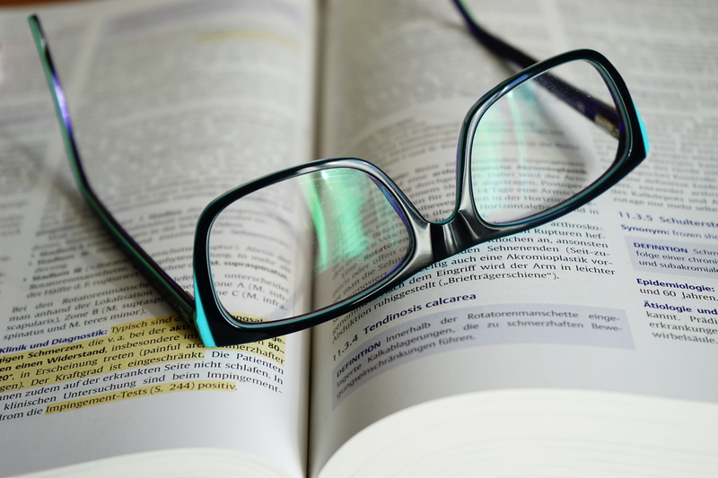 5K, glass - material, font, glasses, high angle view, literature, publication, studying, text, eyeglasses, eyewear, focus on foreground, look up, no people