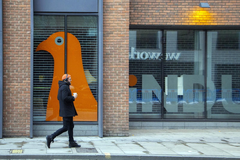 men, man, adult, human, warm clothing, bird, apparel, door, outdoors, shoreditch, built structure, full length, long sleeve, city, real people, clothing