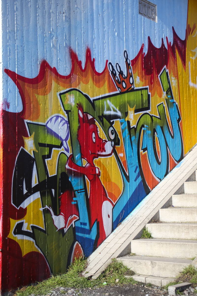 building exterior, paint, built structure, herne, outdoors, concrete wall, art, graffiti, spray, wall - building feature, creativity, street art, human representation