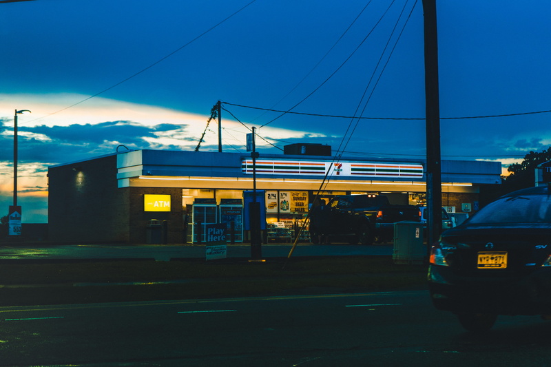 illuminated, railway, transportation, architecture, machine, train, electricity, car, food, terminal, rail, road, pump, building exterior, land vehicle