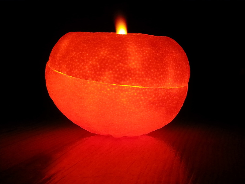 orange peel oil lamps, healthy eating, reflection, flame, heat - temperature, incandescent light, food and drink, candle, nature, dark, light, lighting