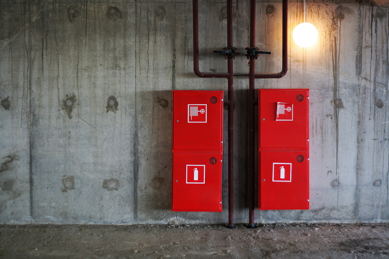 sign, objects, protection, gray, incandescent, vertical, pipeline, town, structure, closed, fire-hose, geometry, gutter, safety, cement, metal, entrance