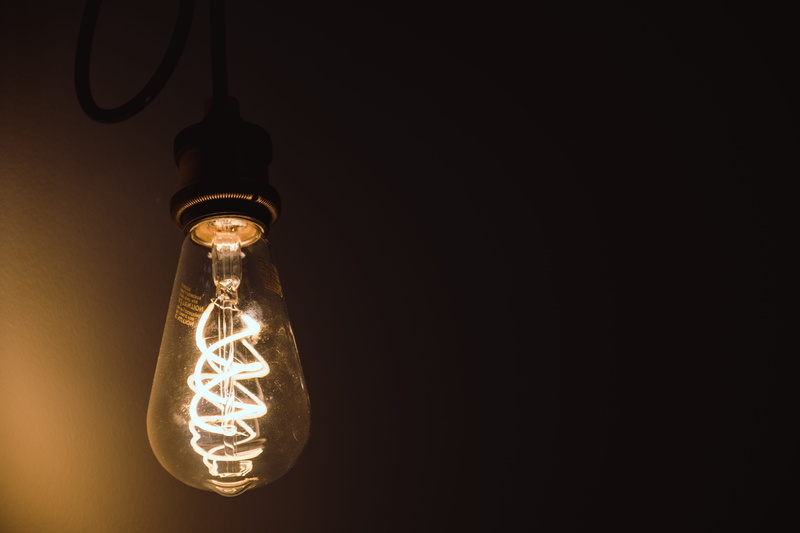 copy space, lighting equipment, projection, black background, energy, ceiling, electrical equipment, close-up, filament, light bulb, incandescent, electric light