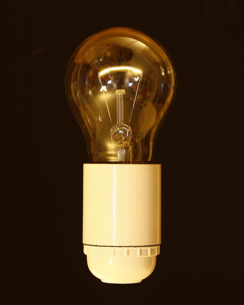 current, light - natural phenomenon, single object, black background, glass, filament, fluorescent, lightbulb, fuel and power generation, glowing, indoors