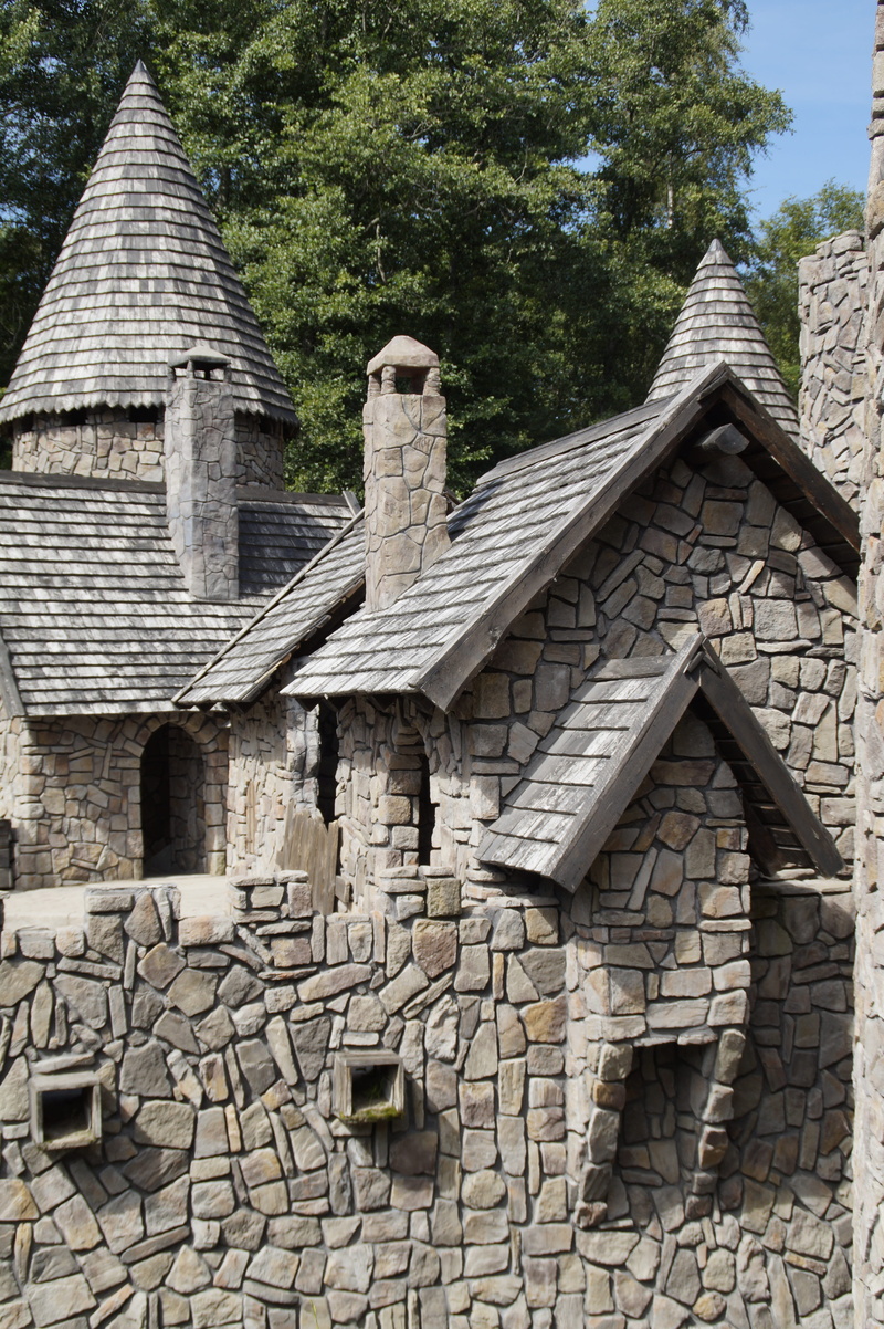 stone material, classic, astrid, ronja, low angle view, no people, theme park, lindgren, childrens book, cultures, matthisburg, roof, tree, architecture