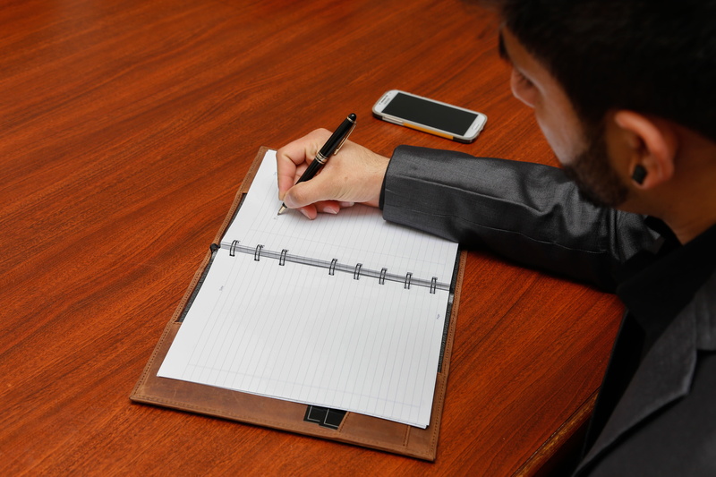 note pad, people, communication, holding, men, male, wood - material, writing, sitting, males, notebook, 5K, person, write, education, paper, note, document