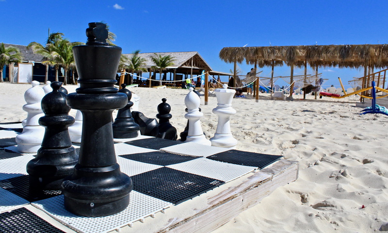 chess piece, sunlight, relaxation, outdoors, sky, beach, trip, no people, 4K, tranquil scene, game, clear sky, nature, check, the bahamas, land, sea, chess