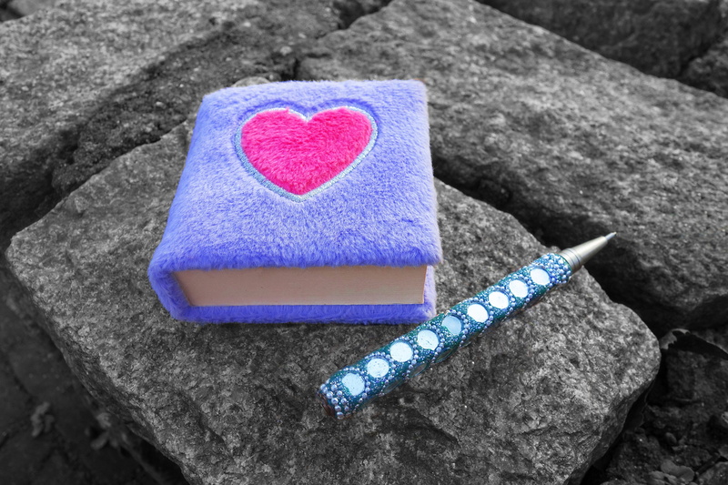 blue, childrens diary, close-up, emotion, writing, rock - object, heart, positive emotion, purple, outdoors, shape, notes, agenda, solid, diary, still life