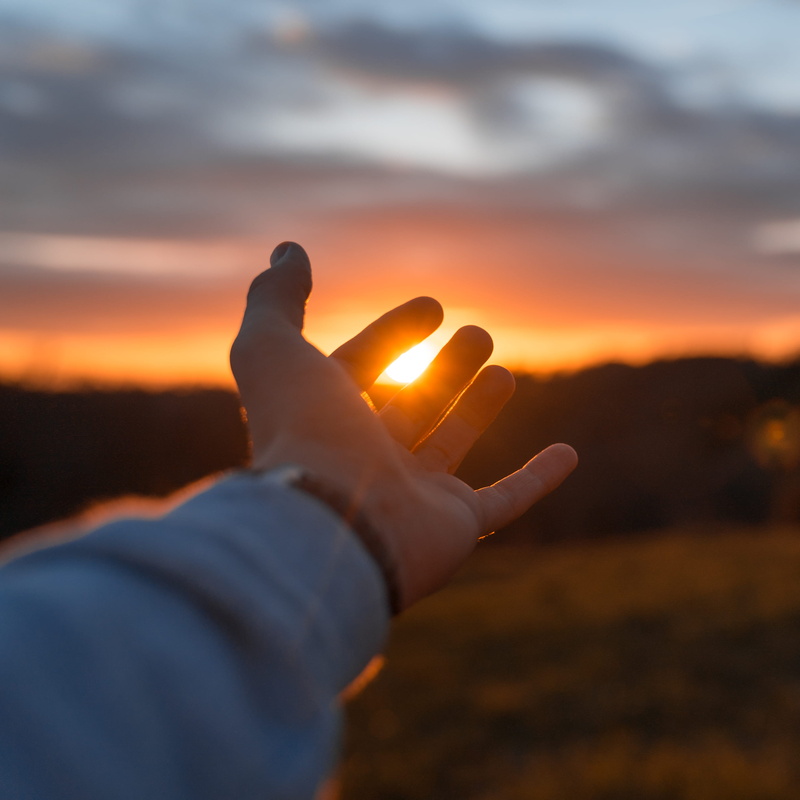 body part, personal perspective, outdoors, photography, orange color, outdoor, showing, vibe, sunset, lifestyles, sunlight, leisure activity, sleeved, human body part