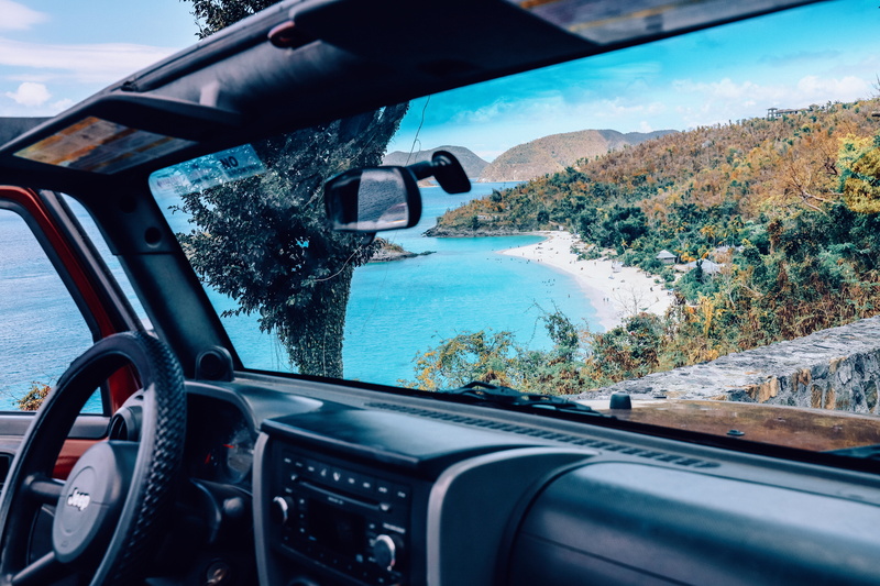 car interior, one person, jeep, transportation, outdoors, control panel, caribbean, car, water, virgin islands, start livin, wheel, vehicle, mode of transportation