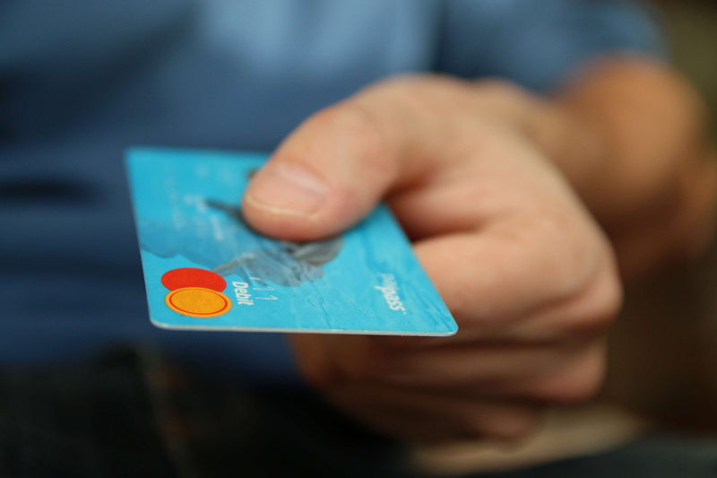 focus on foreground, indoors, businessman, give, banking, hand, human, finance, debit, electronic, cash, wireless technology, identity, money, card, modern