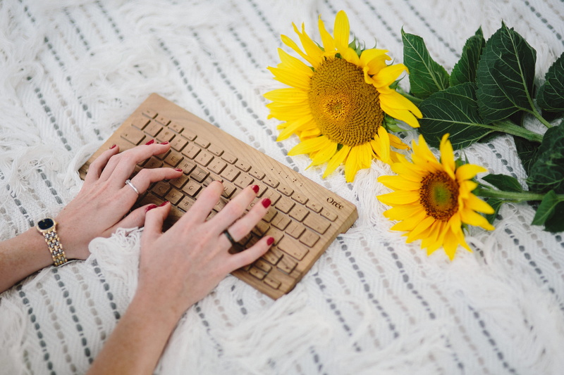 nature, freshness, flower head, plant, lifestyle, human body part, outdoor, close-up, sunny, one woman only, typing, time, adult, light, human Hand, book