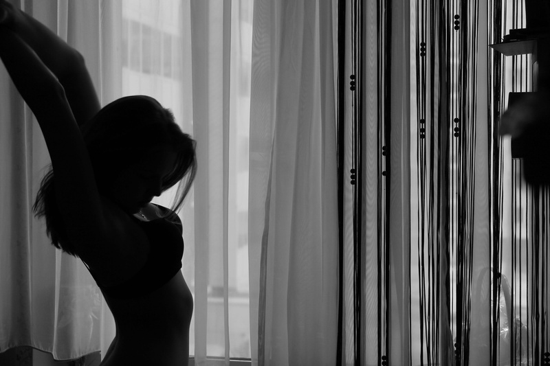 indoors, human arm, women, young adult, silhouette, day, grace, dawn, one person, home interior, side view, men, glass - material, leisure activity, standing
