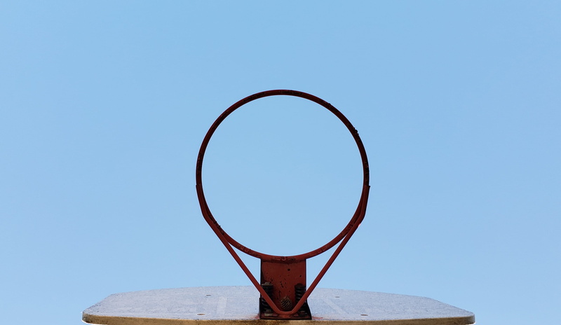 focus on foreground, building, fisheye, amusement park, clear sky, day, single object, directly below, outdoors, geometric shape, nature, blue, hoop, hole