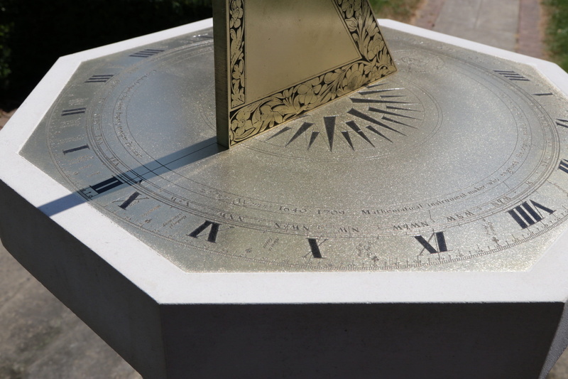 sundial, high angle view, number, built structure, pedestal, nature, sun dial, cold temperature, architecture, communication, manor house, the past, outdoors