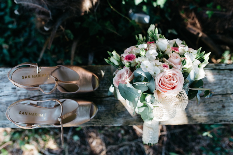 outdoors, rose - flower, flower arrangement, wedding ceremony, focus on foreground, pair, grey, vulnerability, wedding, shoe, outdoor, fragility, flowering plant