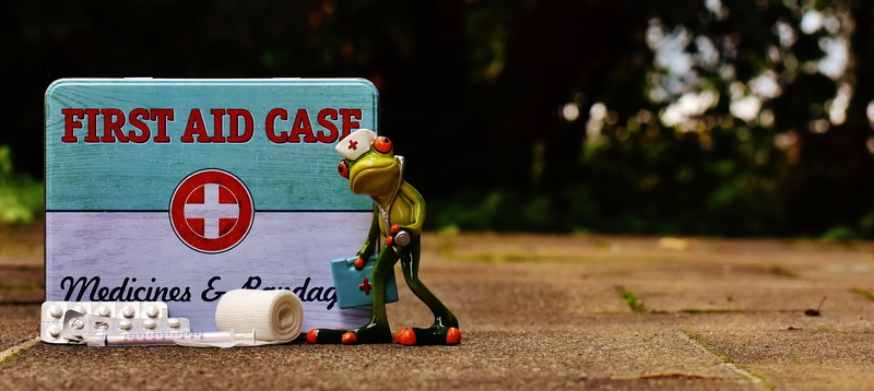 focus on foreground, day, box, childhood, outdoors, transportation, first, text, sign, cute, emergency, communication, tree, figurine, eye, western script