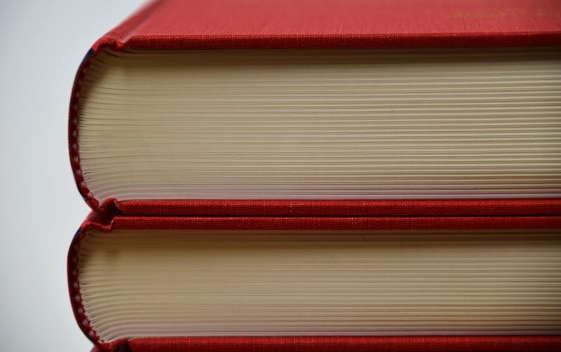 cover, studio shot, bound books, shape, note pad, single object, reading, cut out, book collection, read, books, striped, copy space, hardcover book, stack