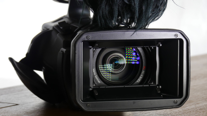 device screen, black color, screen, reflection, front view, photographic equipment, electrical equipment, shiny, camera - photographic equipment, light