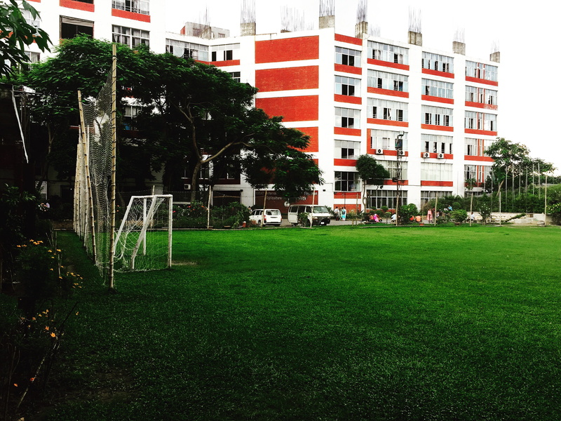lawn, mode of transportation, outdoors, apartment, no people, car, green, dhaka, green color, city, plant, structure, built structure, land vehicle, day