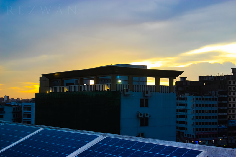 dhaka north city corporation market, no people, environmental conservation, building exterior, outdoors, sun, solar panel, dhaka, sunset, alternative energy