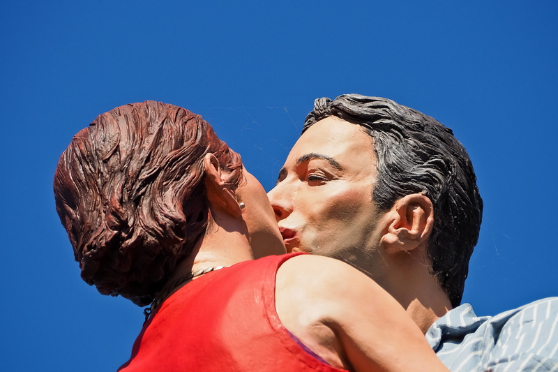 embrace, clear sky, figures, portrait, human body part, sculpture, love, man, young adult, sunny, positive emotion, artwork, human hair, sunlight, artists