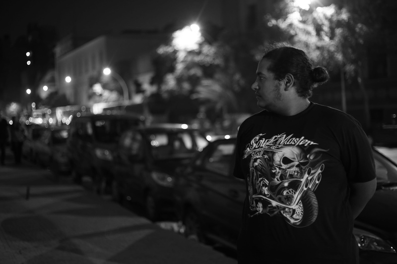 one person, street lamps, street lights, side view, looking, transportation, depth of field, person, lifestyles, lights, portrait, adult, male, evening