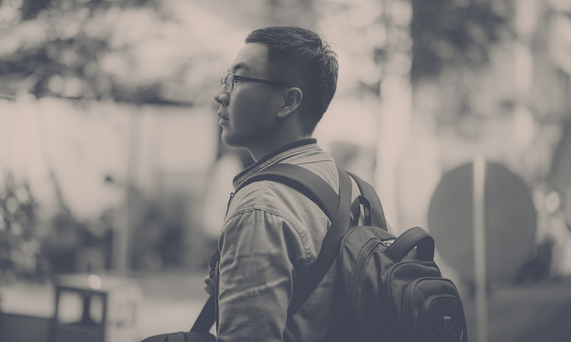 grayscale, casual clothing, outdoors, looking, side view, blur, portrait, monochrome, young adult, men, wearing, one person, light, clothing, street, males