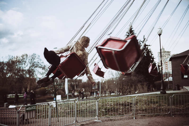 domestic, no people, transportation, flying, architecture, swing, plant, dom, building exterior, hand, park, nature, girls, outdoors, built structure, the carousel of fairy tales