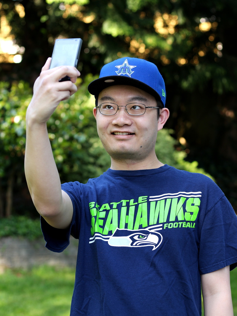 social media, seattle, uniform, photography themes, photo, 4K, focus on foreground, seahawks, communication, front view, wireless technology, smart phone