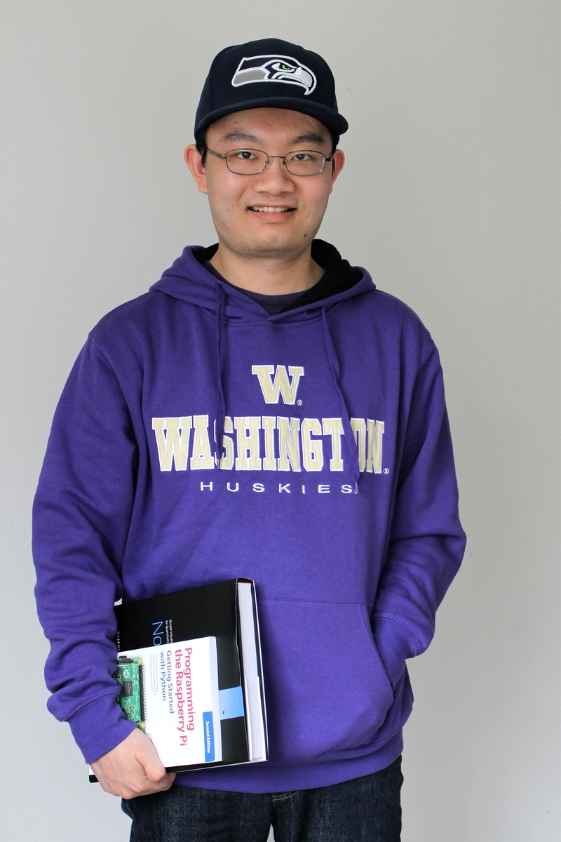 indoors, smiling, confidence, emotion, front view, books, glasses, washington, 4K, student, standing, millennial, young, education, one person, communication