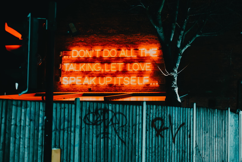 outdoors, text, glowing, food and drink, speak, signage, barbecue, close-up, 5K, love, illuminated, wood - material, wall - building feature, heat - temperature